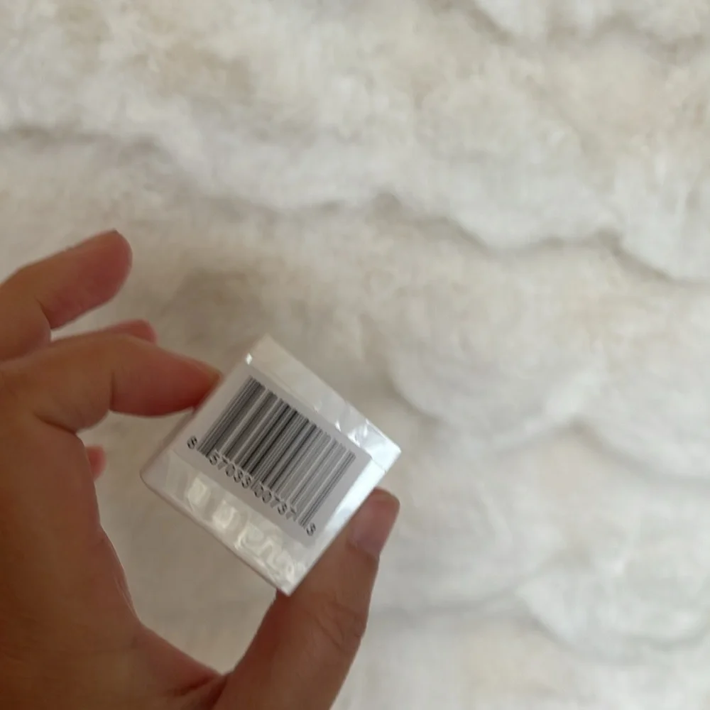 White eyeliner sharpener with Signature Logo